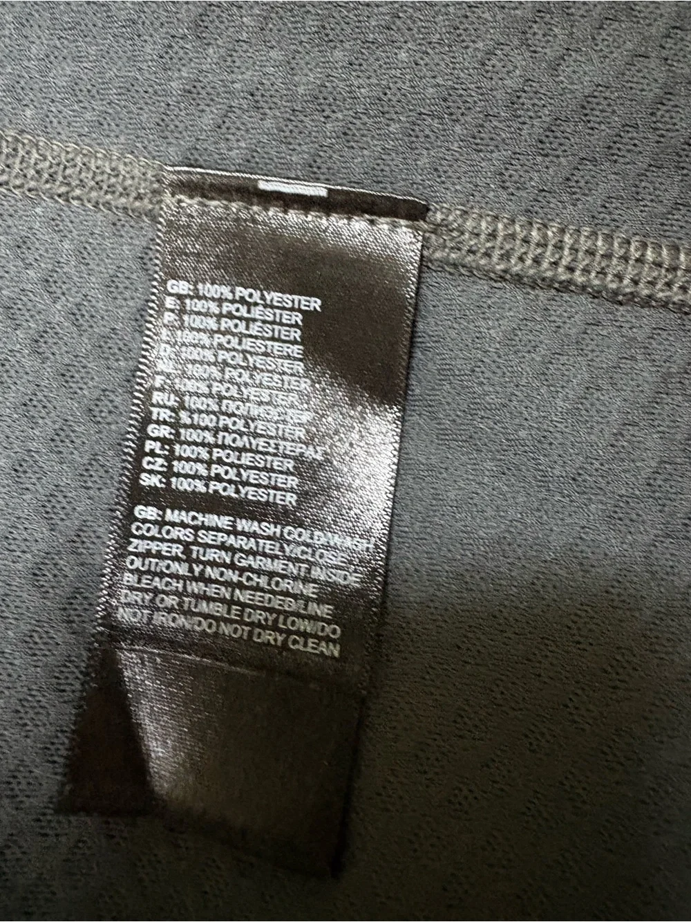 The North Face Black Half-Zip Performance Top with Gold Logo